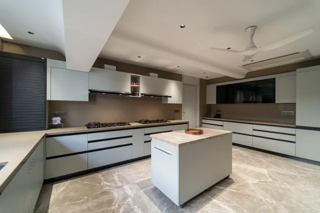 C-Shaped White Modular Kitchen with Island