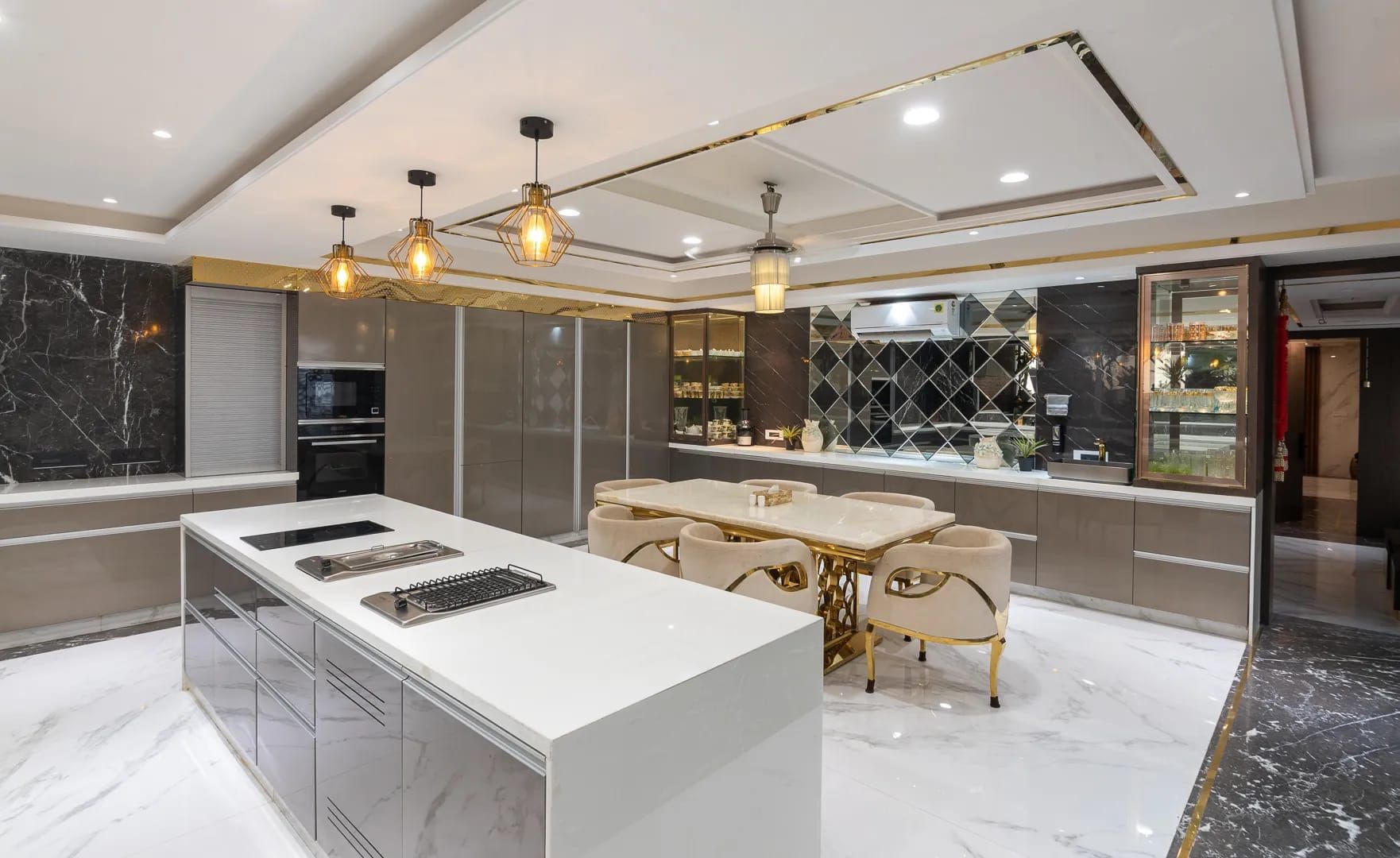 C-Shaped White and Gold Modular Kitchen