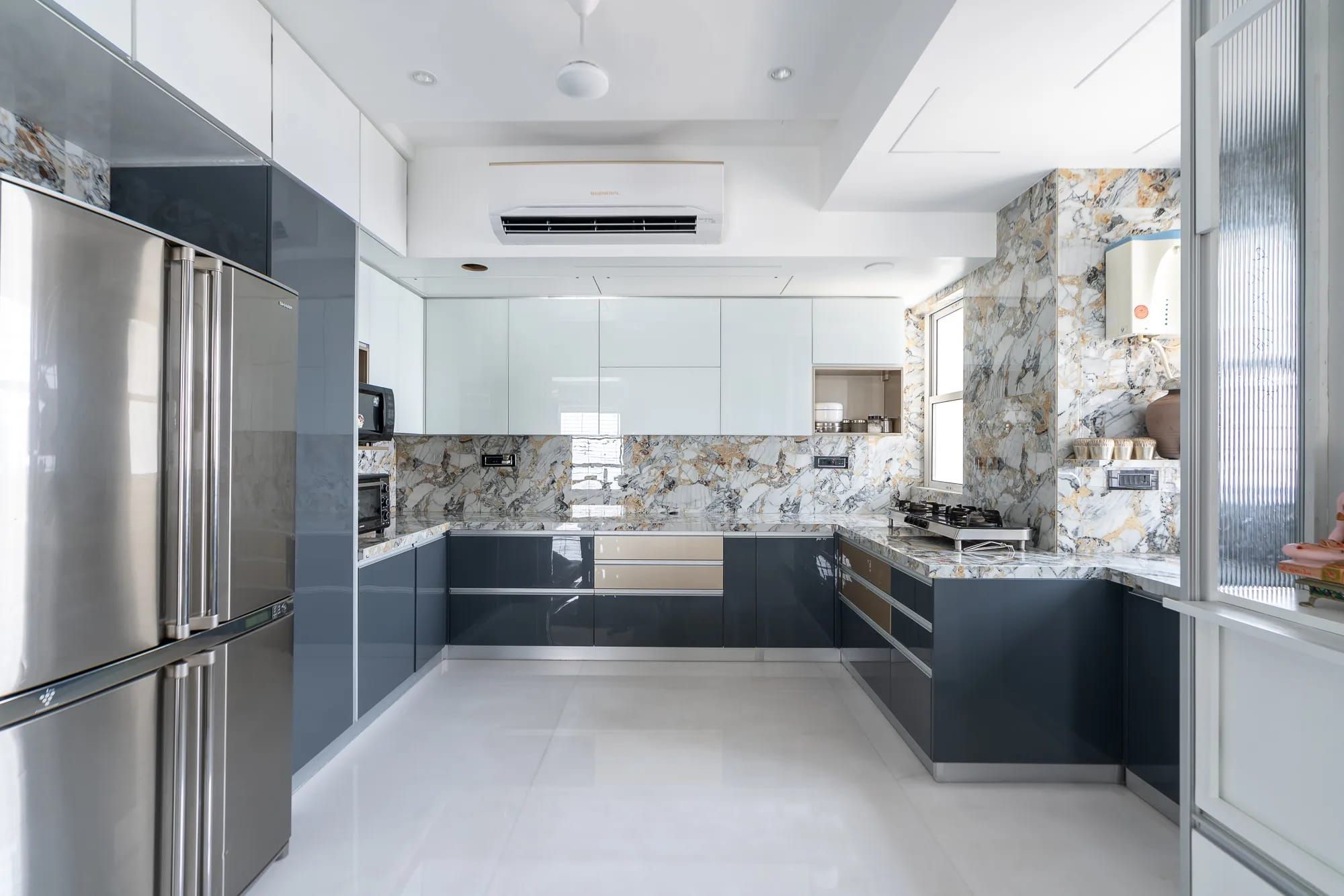 Blue and White C-Shaped Modular Kitchen